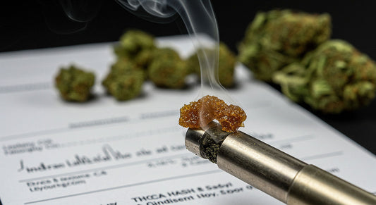 Macro shot of THCA hash on a titanium nail with swirling vapor, lab report, and cannabis buds in the background, merging science and use.