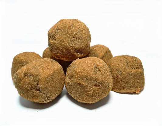 hash rocks, earthy yellow looking, very spherical in shape 83655