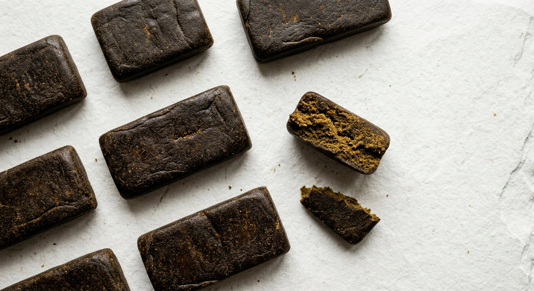 afghan hash dark brown pressed slabs broken open showing interior texture Hurcann