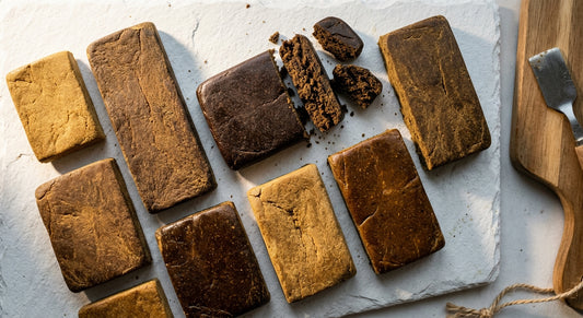CBD hash platte slabs wholesale flat lay showing color and texture variations Hurcann