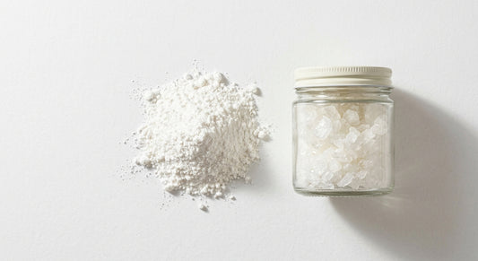 CBD isolate wholesale bulk powder and crystals on white surface Hurcann