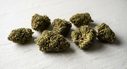 premium CBD hemp flower buds flat lay showing trichome quality Hurcann