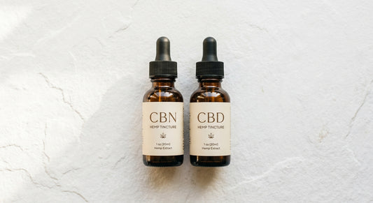 CBN vs CBD for sleep tincture bottles side by side on white surface Hurcann
