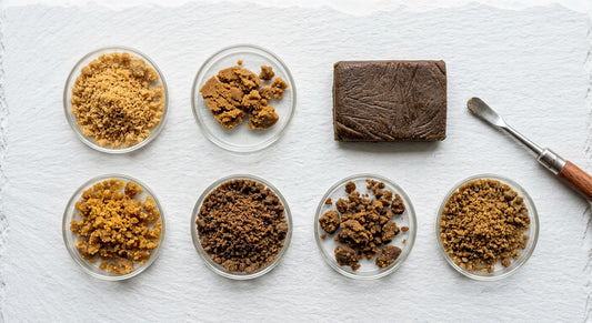 hash making process showing various grades of hemp bubble hash on white surface