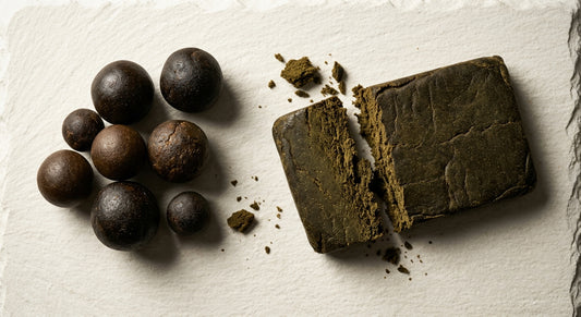 hash origin Afghan pressed hash balls and slab showing dark brown exterior olive interior