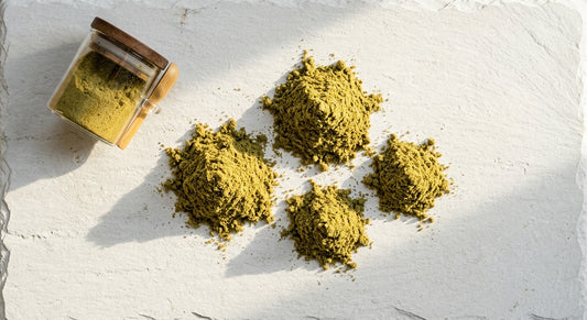 hemp kief wholesale europe bulk golden CBD kief powder on white surface Hurcann