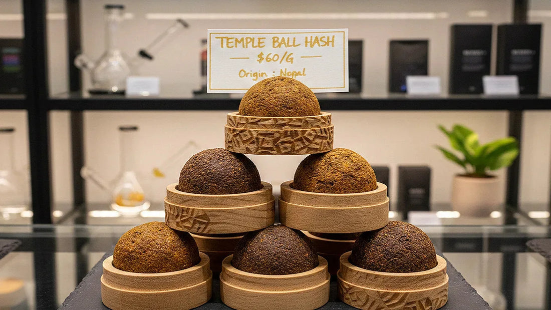 Premium temple ball hash displayed in a modern dispensary with artisan packaging and visible pricing | Hurcann