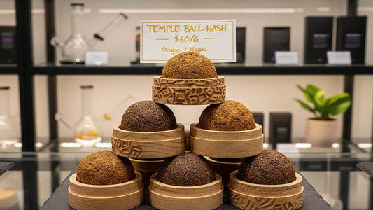 Premium temple ball hash displayed in a modern dispensary with artisan packaging and visible pricing | Hurcann