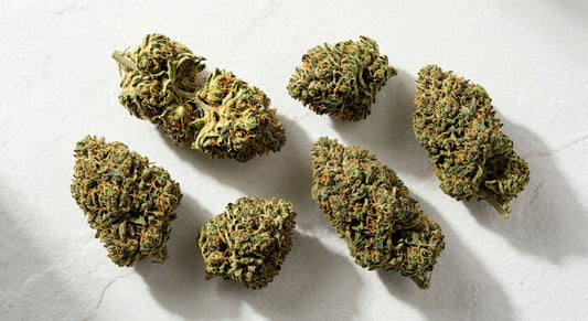 smokeable CBD hemp flower buds flat lay premium cured indoor grown Hurcann