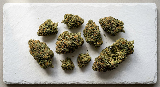 smoking CBD hemp flower dense green buds flat lay white surface 2026 guide