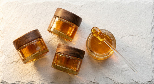 THCA distillate wholesale bulk jars amber hemp concentrate on white surface Hurcann