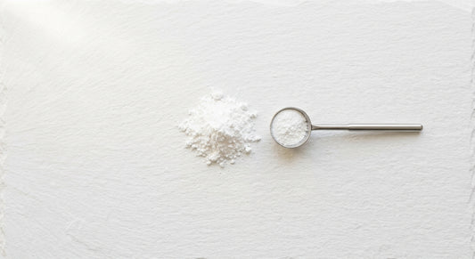 powdered CBD isolate fine white powder on white surface wholesale hemp 2026