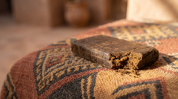Pressed Moroccan hash bar on a woven rug