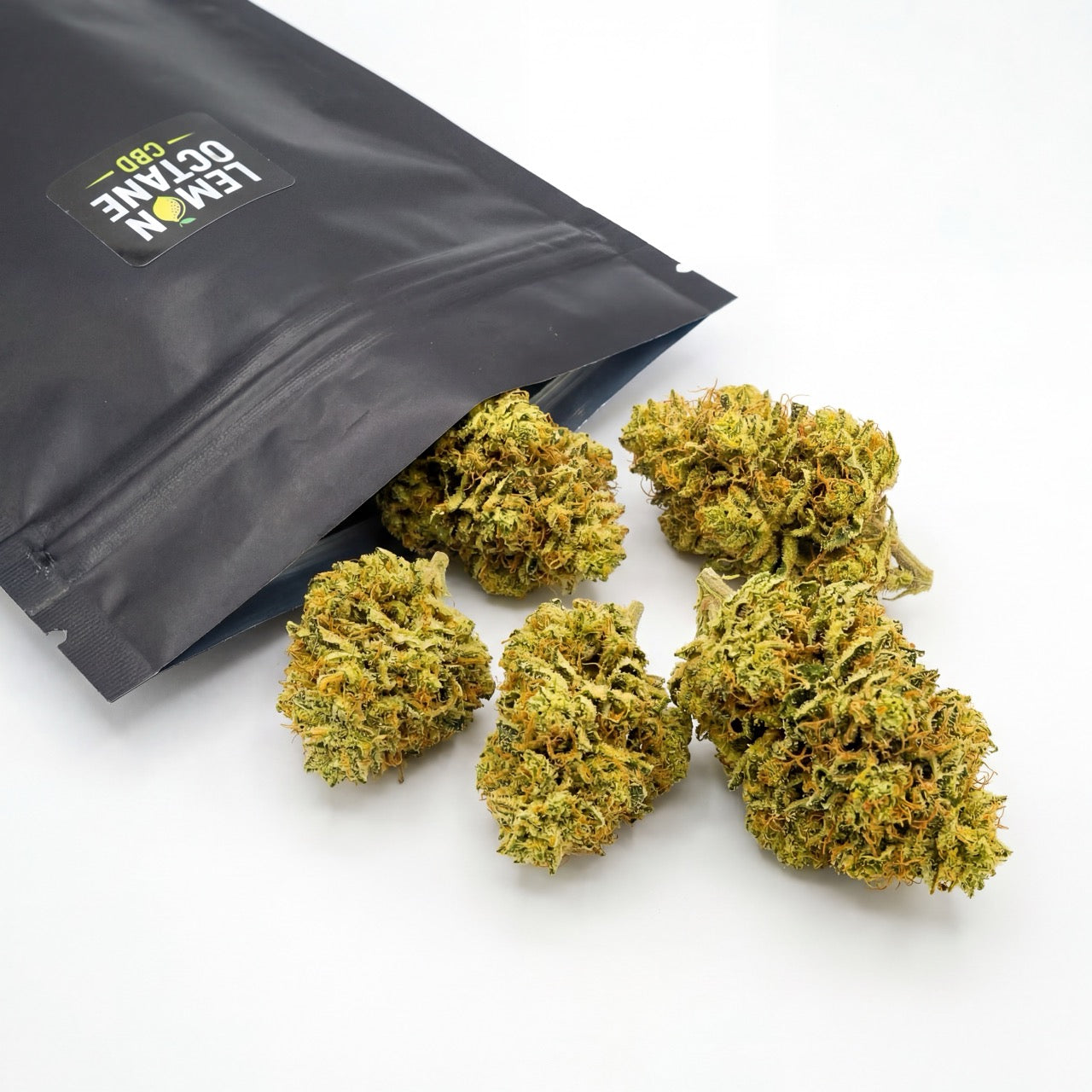 Lemon Octane CBD flower displayed alongside protective packaging used for storage and transport. The packaging helps maintain freshness, aroma and overall product integrity.