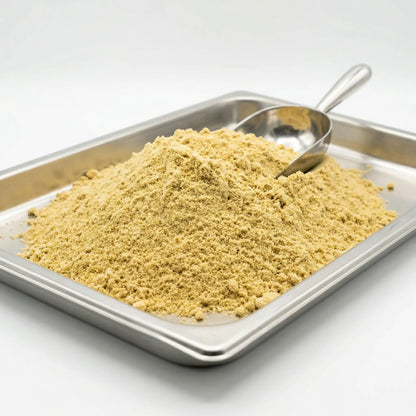 Bulk CBG kief powder on a stainless steel tray with metal scoop — wholesale white hemp-derived CBG kief, white background | Hurcann