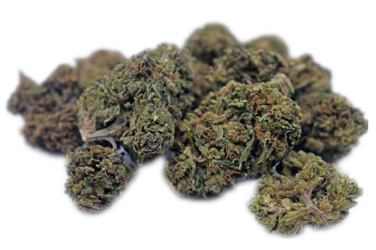 A fresh pile of Hawaiian Haze CBD flower, showcasing vibrant, trichome-coated buds with a citrus-pineapple aroma, known for its smooth smoke and energetic effects | Hurcann