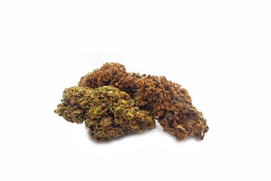 Legendary OG CBD flower showcasing unique colors with deep green, purple, and orange hues, covered in frosty trichomes for a premium indica hemp experience | Hurcann