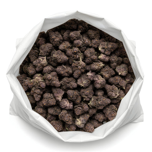 Wholesale photo of Jealousy THCA hemp flower hybrid AA grade, bulk display of frosty dark green buds with 29 percent THCA