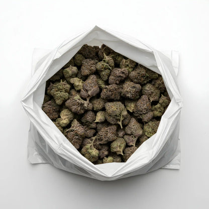Wholesale photo of Texas Pound Cake THCA hemp flower indica AAA grade, bulk display of dense purple green buds coated in white trichomes, 32 percent THCA, Sunset Sherbet lineage