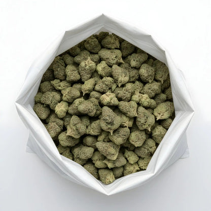 Wholesale photo of Cream Cake THCA hemp flower indica AA grade, bulk display of dense frosty buds with 26 percent THCA and dessert terpene profile | Hurcann
