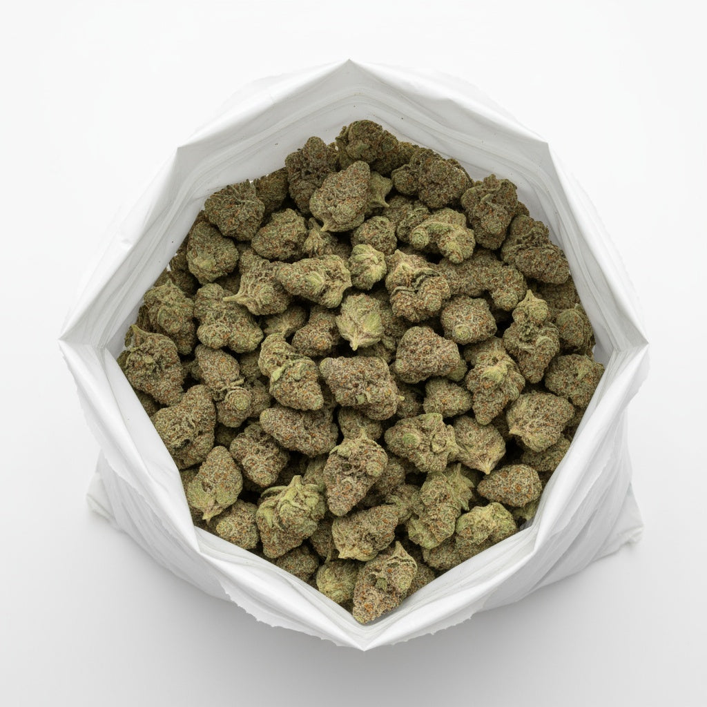 Jokerz buds are vibrant with shades of purple and green wrapped in a dense coat of trichomes. 