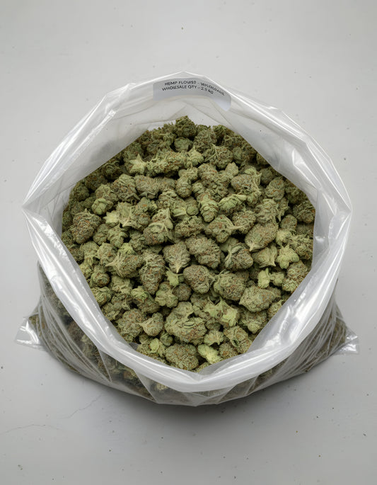 Wholesale photo of Sour Diesel THCA hemp flower hybrid AA grade, bulk display of frosty light green buds with 20 percent THCA