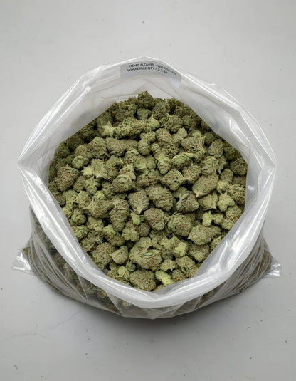 Wholesale photo of Sour Diesel THCA hemp flower hybrid AA grade, bulk display of frosty light green buds with 20 percent THCA