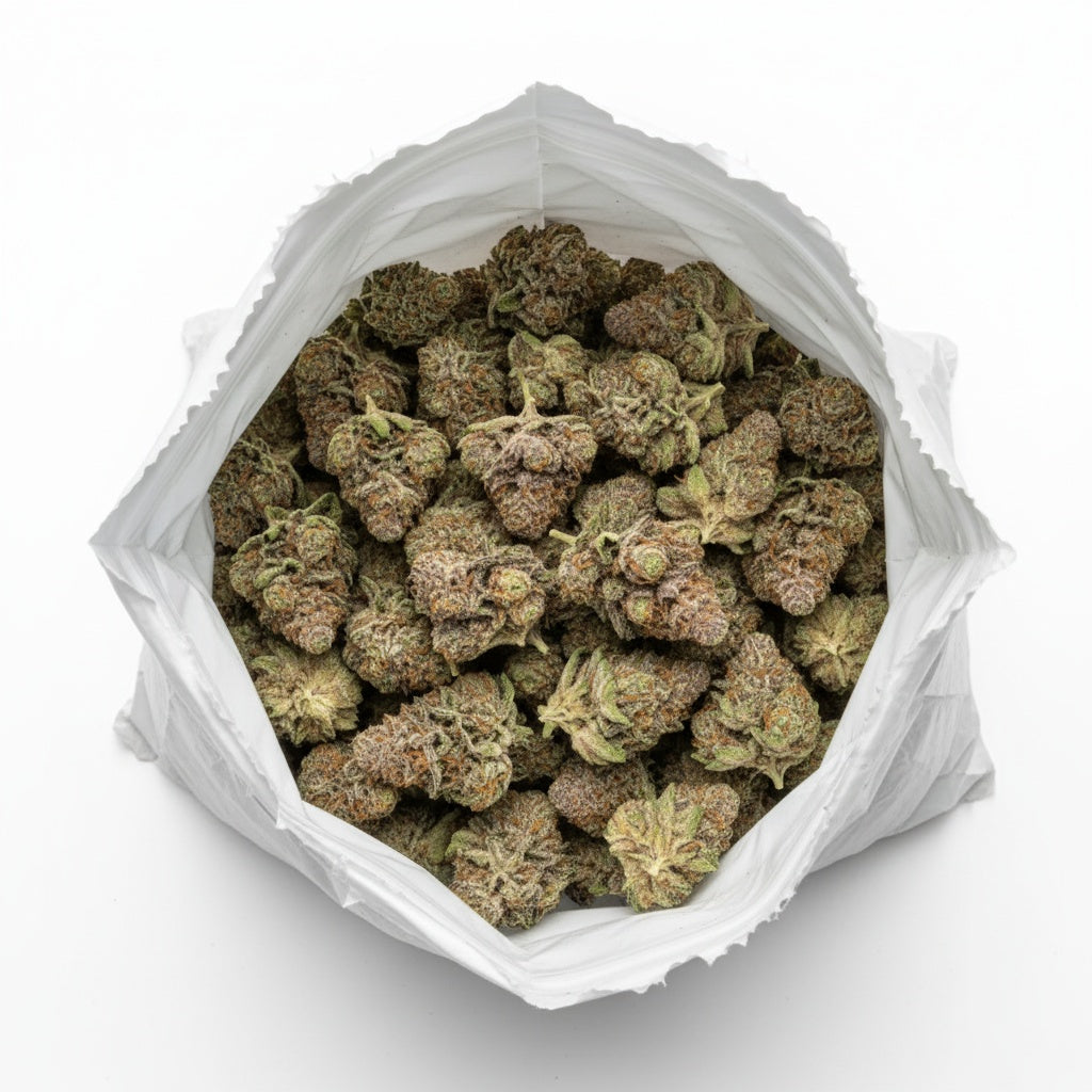 Emerald green buds dusted in shimmering trichomes with fine red pistils throughout.